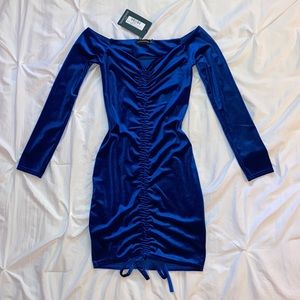 Prettylittlething dress. Size US 4. Off the shoulder mini dress. Front tie.